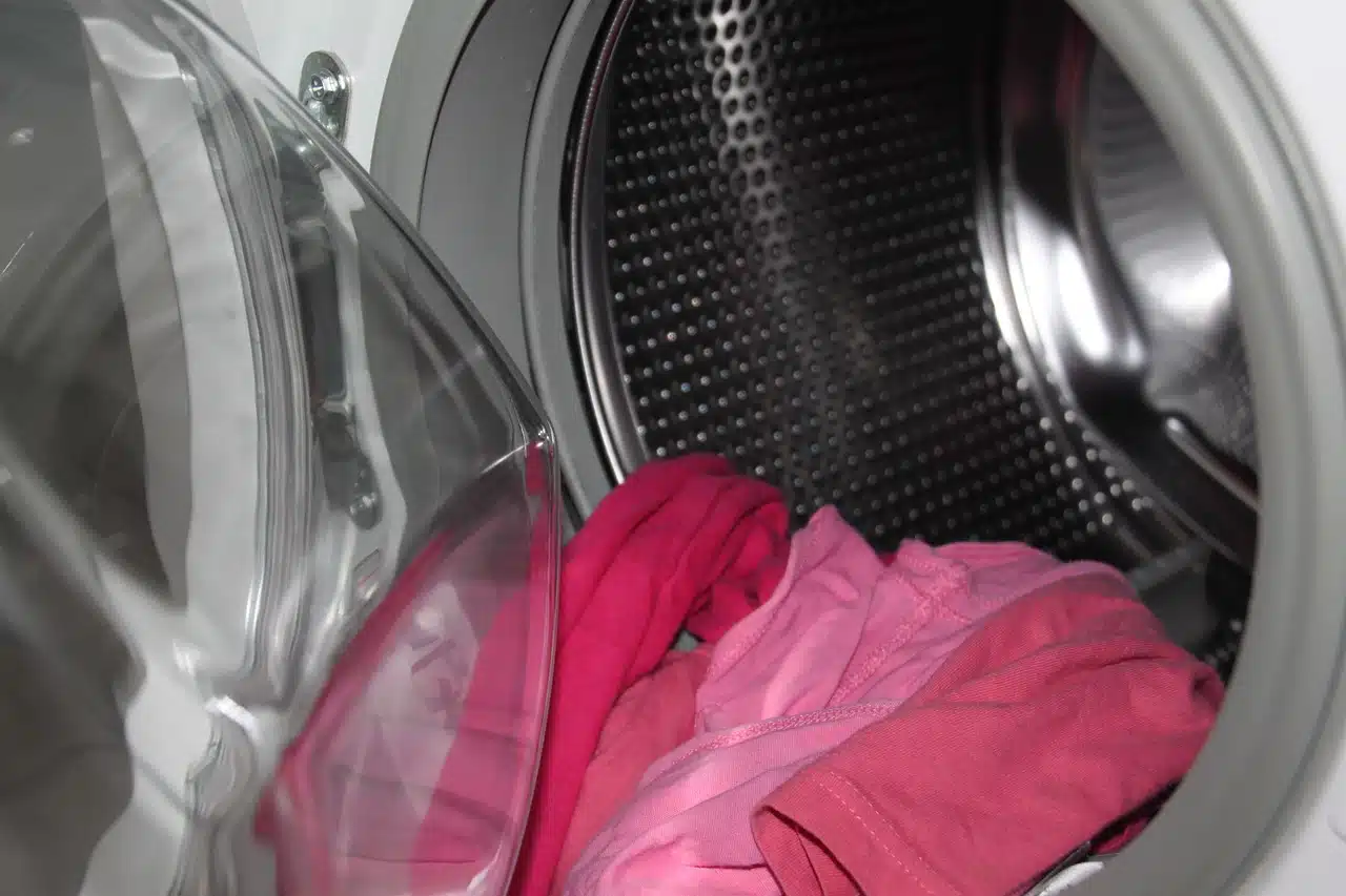 Washing machine with dryer and iron